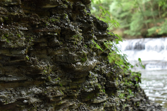 Rocks With River Background